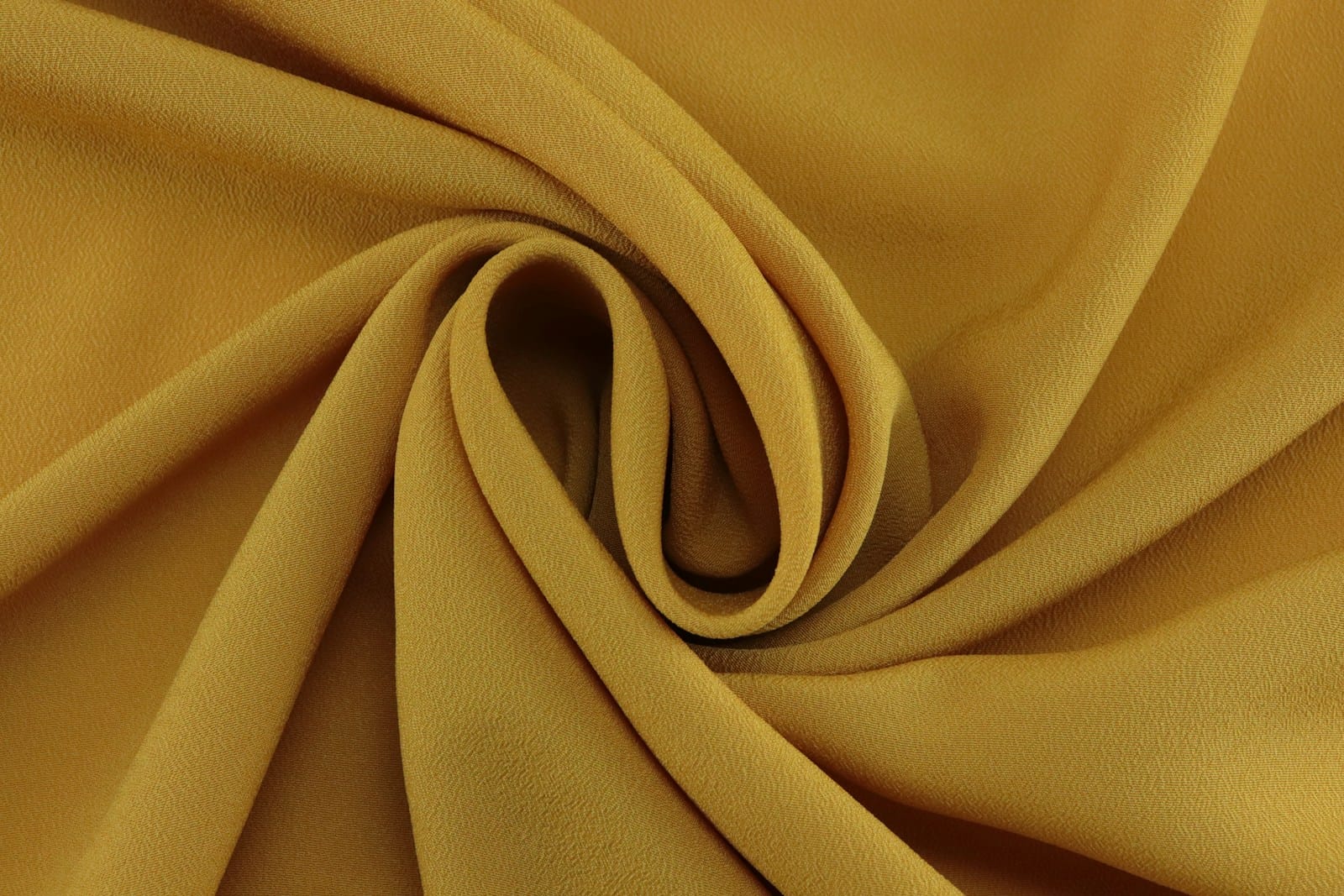 brown textile in close up photography