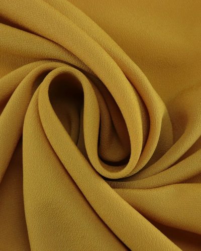 brown textile in close up photography